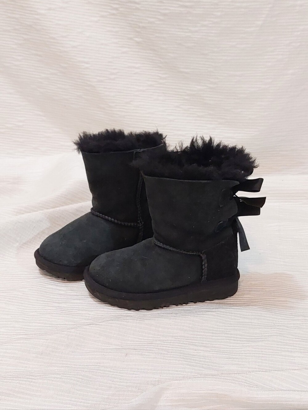 UGG Kids Black Suede Boot with Fur Trim and Back Bows Size 8